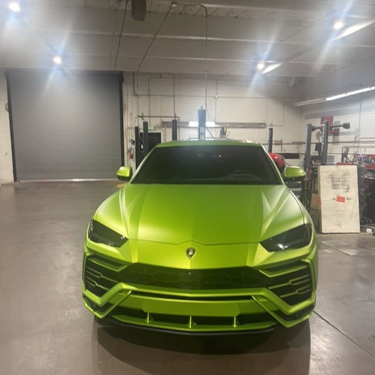 Lamborghini Urus with tinted glass in the A&M Graphics shop