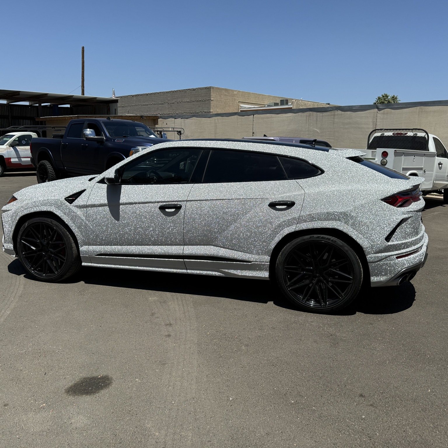 Lamborghini Urus in a diamond sparkle color-change wrap by A&M Graphics